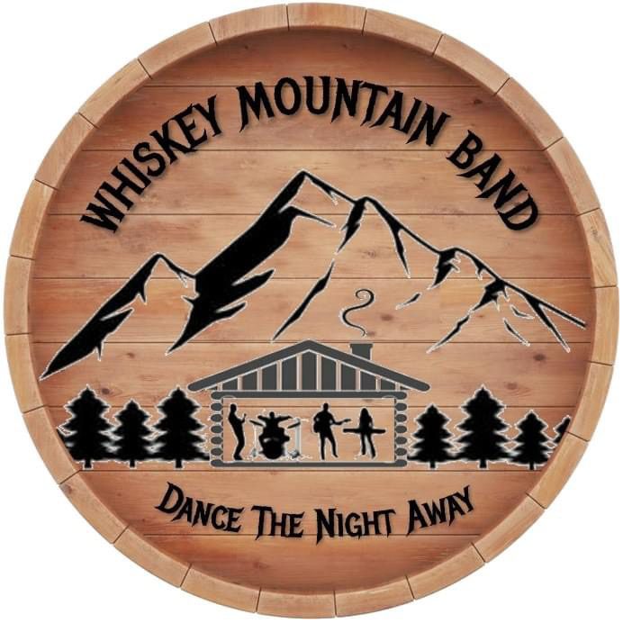 A wooden barrel with the words whiskey mountain band on it.