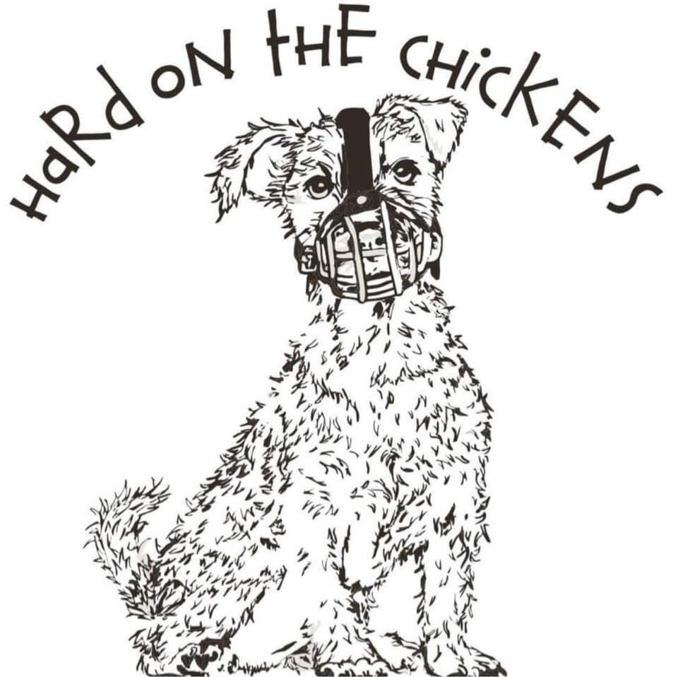 A dog with a muzzle on its face and the words " hard on the chickens ".