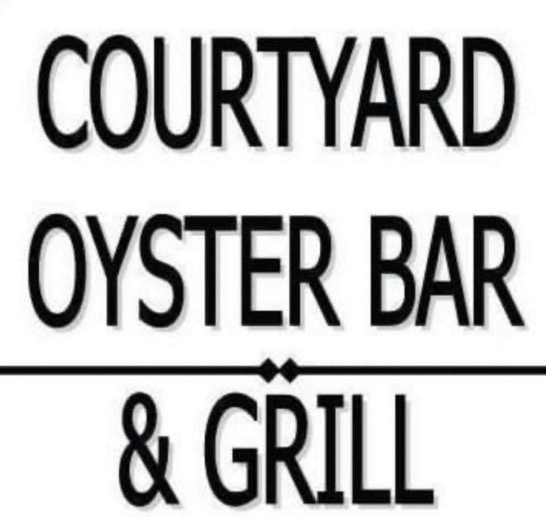 A black and white logo for the courtyard oyster bar.