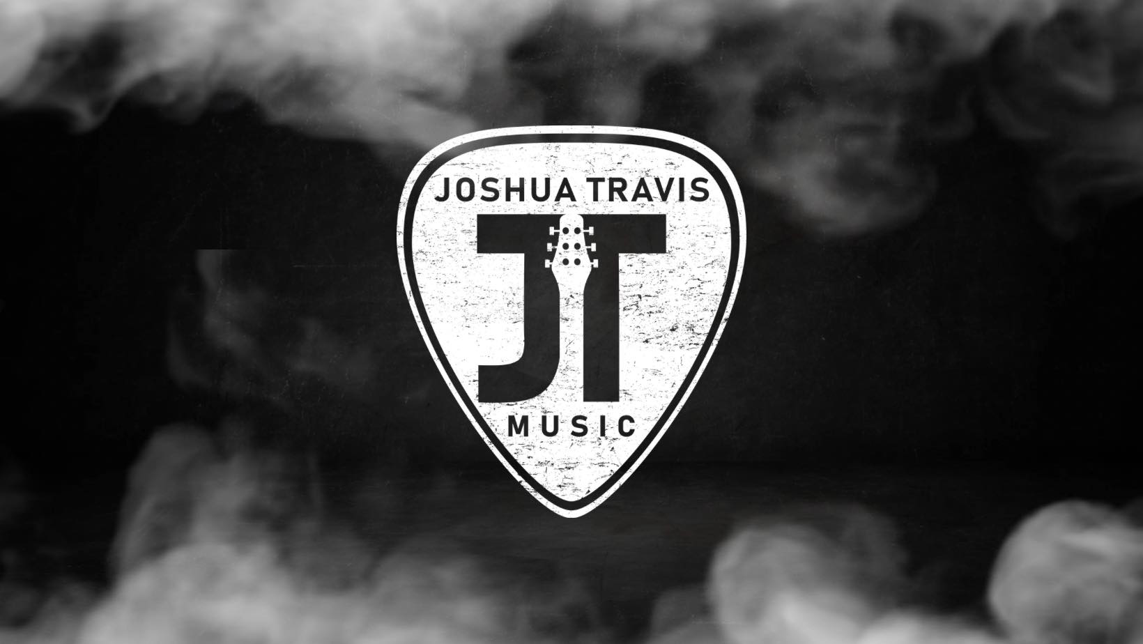 A black and white image of the joshua travis music logo.